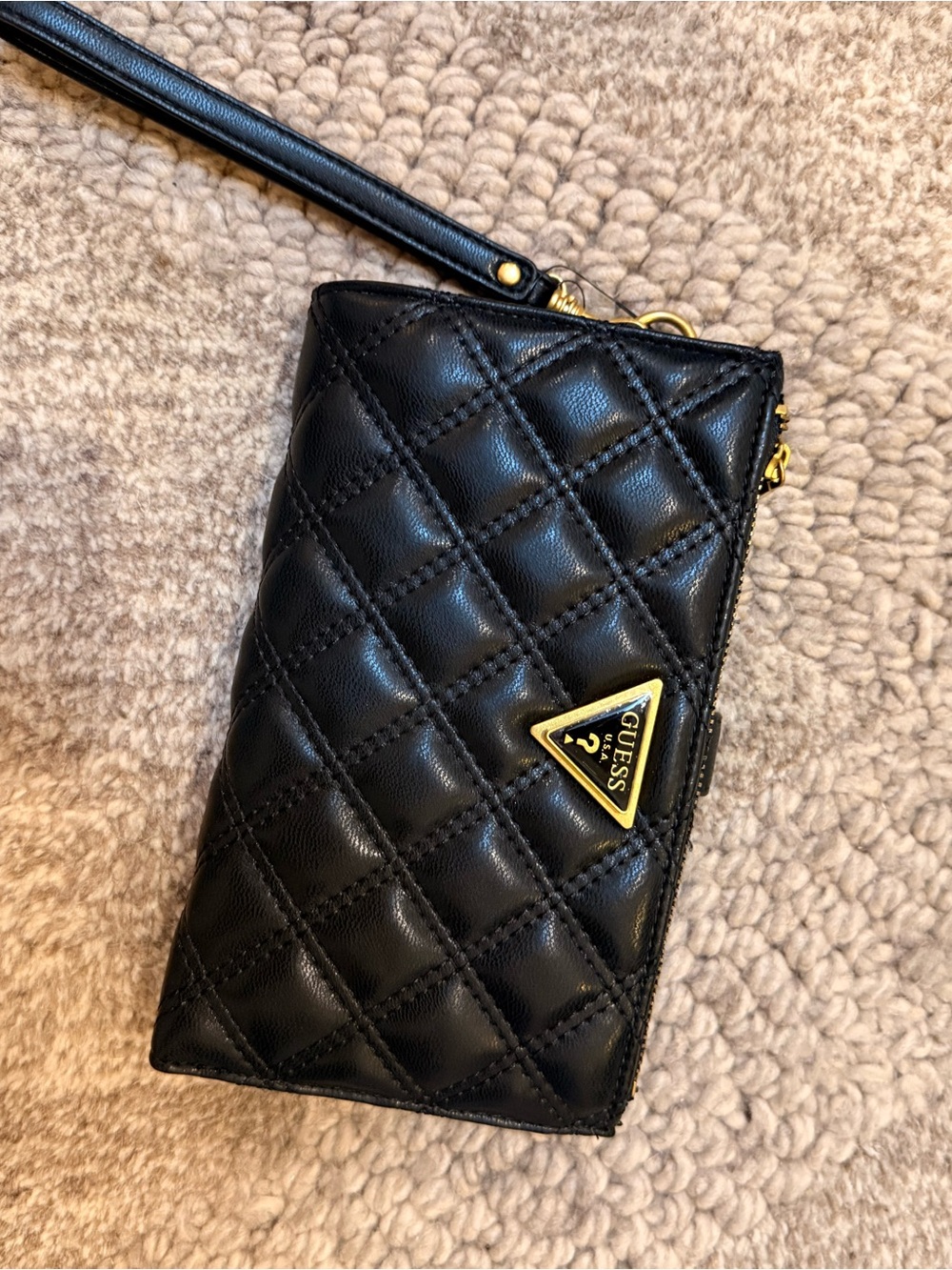 GUESS Quilted Black Wristlet with Gold Triangle Logo